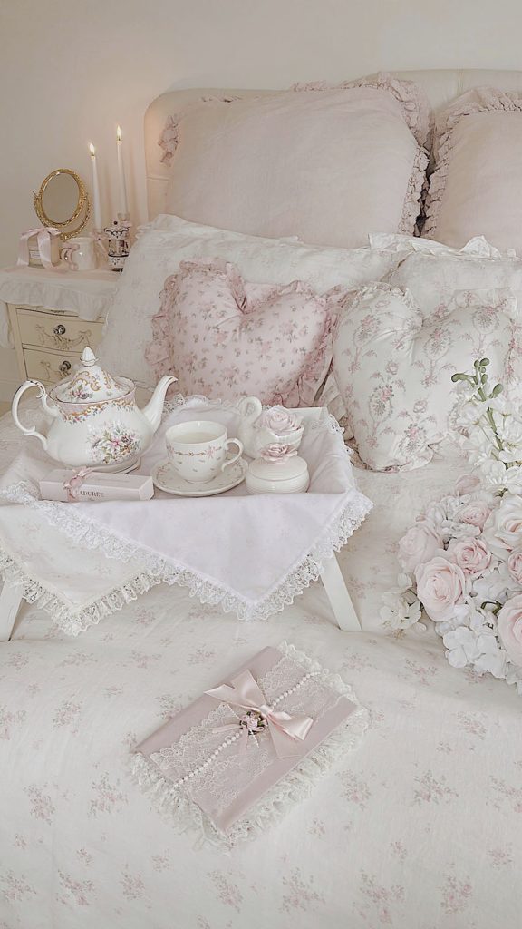 White ruffled bedding shabby chic style with pink roses and tea tray