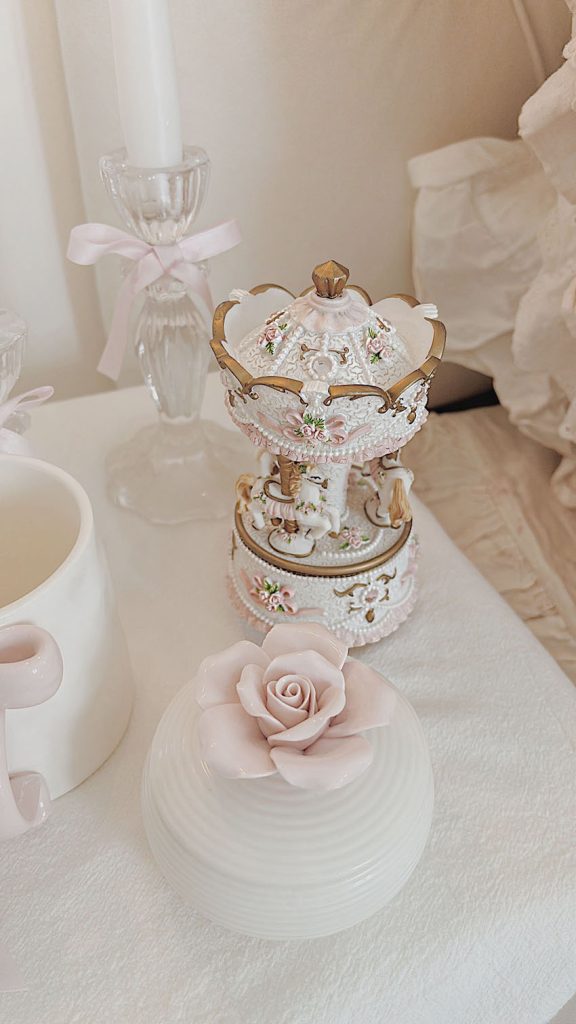 Vintage shabby chic carousel decor in a romantic bedroom setting