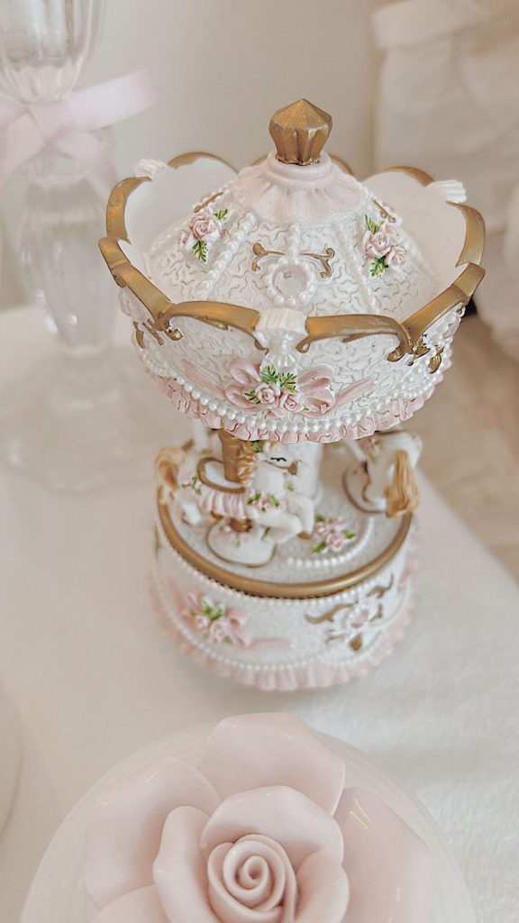 Vintage shabby chic carousel decor in a romantic bedroom setting